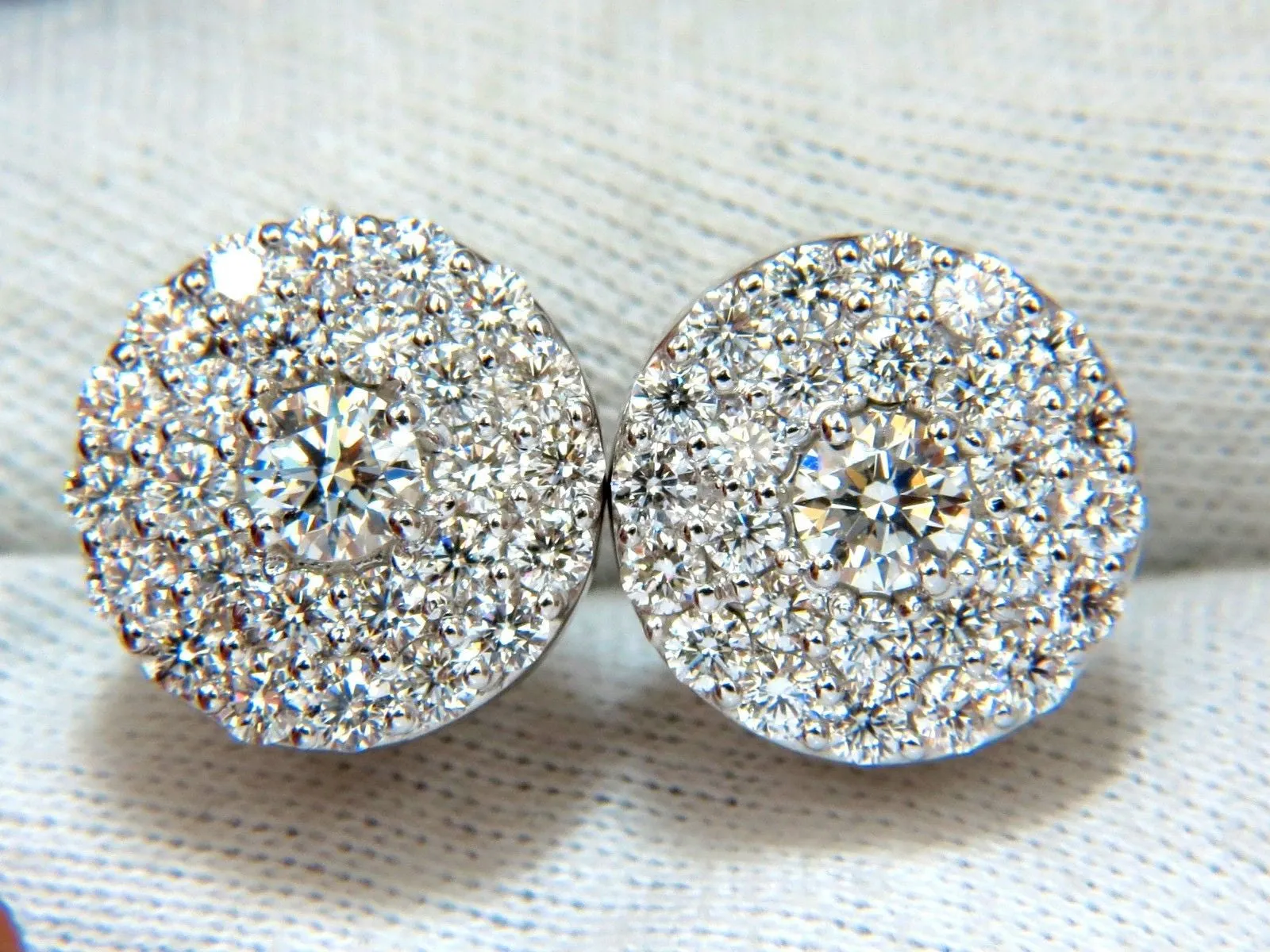 GIA Certified 4.60ct. Matching diamond cluster circular earrings omega