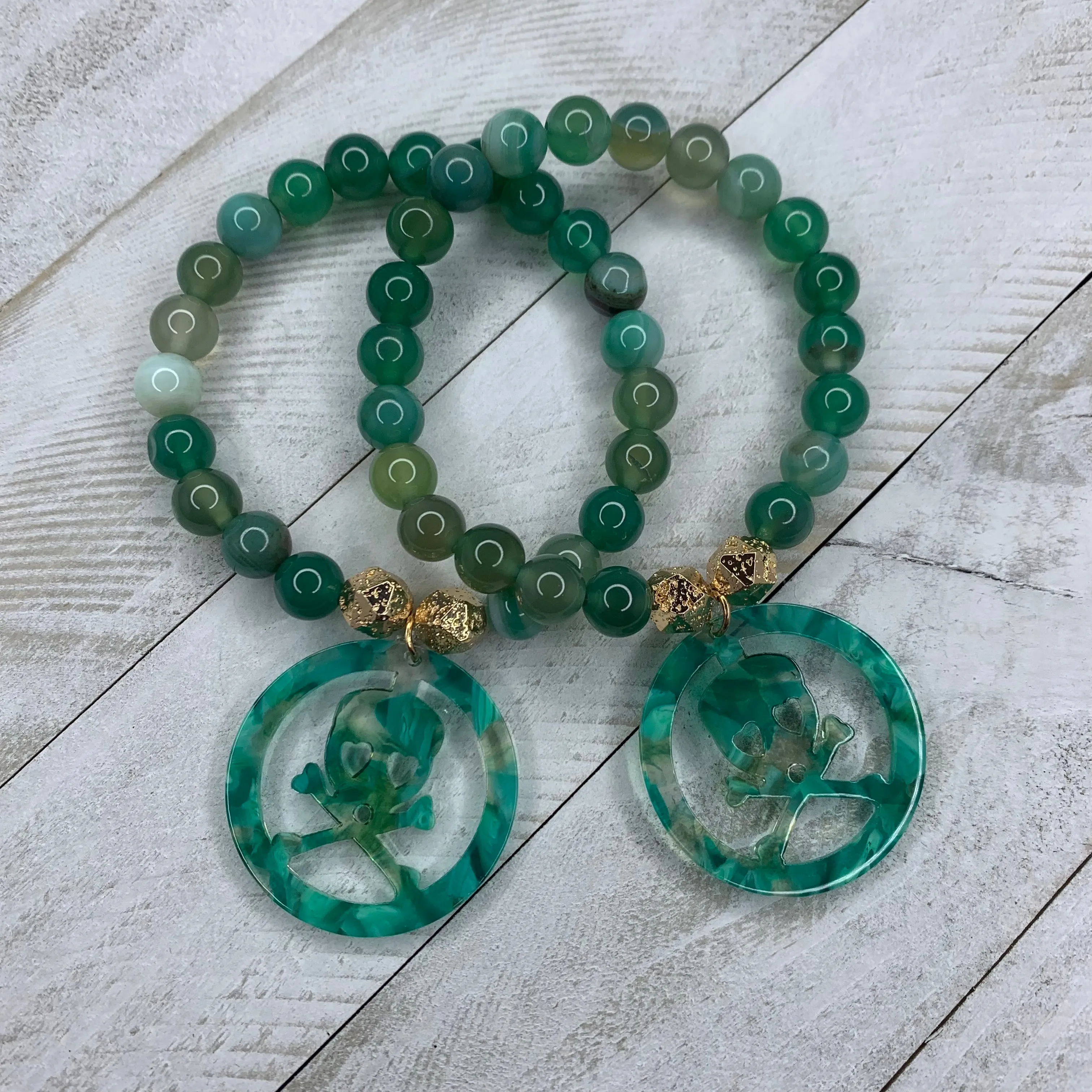 Green 6mm Agate Beads Bracelet with an acetate crossbones and skull charm 410-11 | Erika Williner Designs