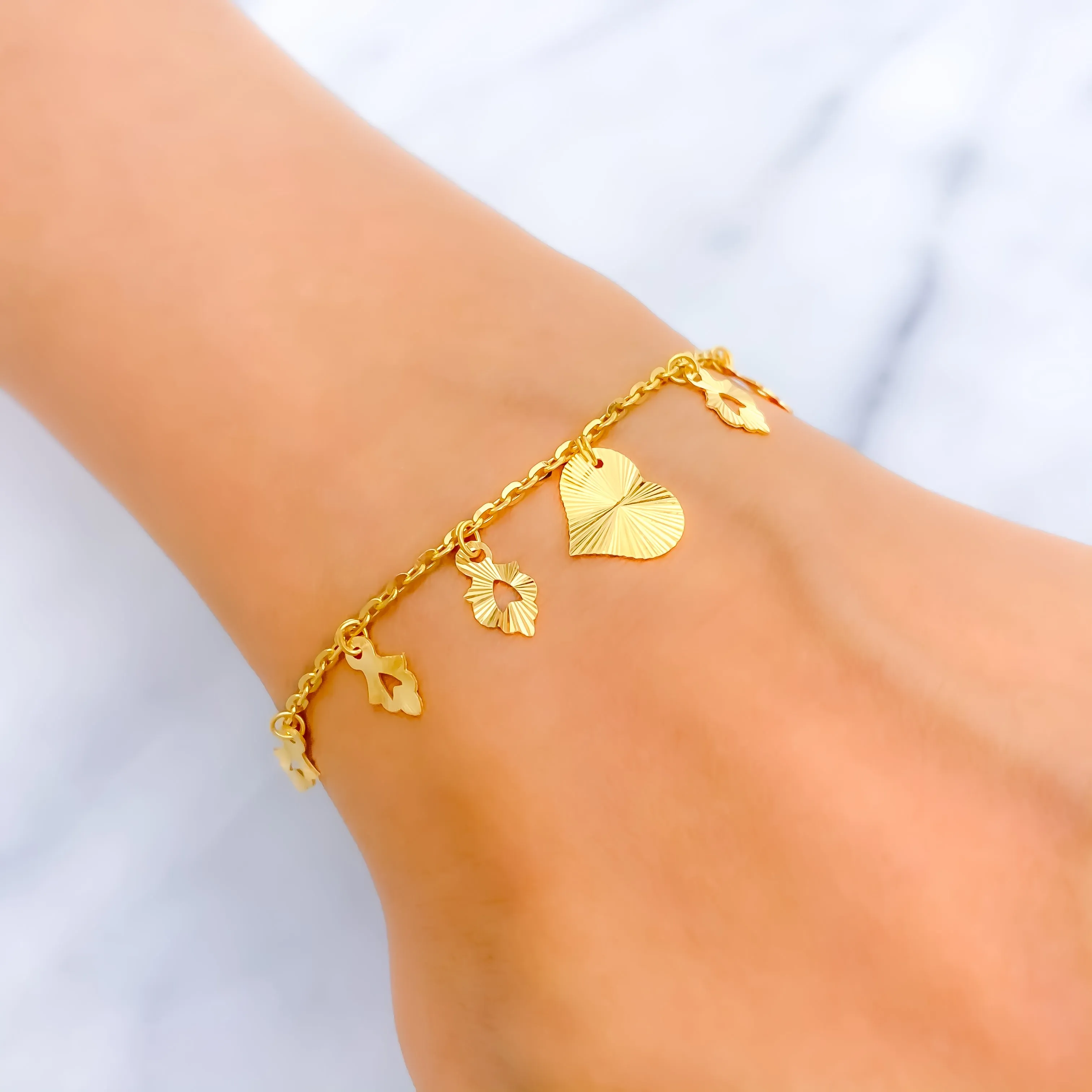 Iconic Sparkling 22K Gold Charm Bracelet