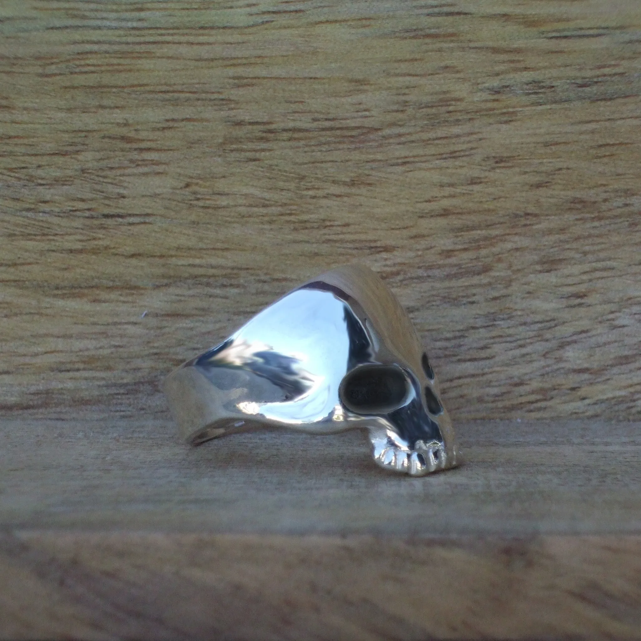 Large Sterling Silver Skull Ring set with .01 diamond